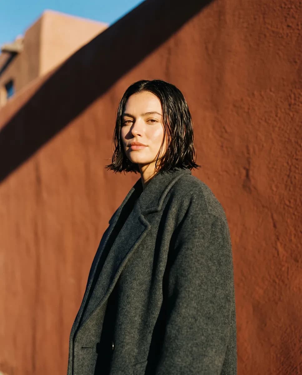 Editorial portrait in hard afternoon sun